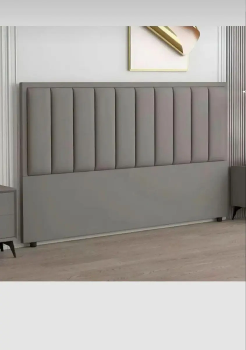 Light grey vertical channel headboard