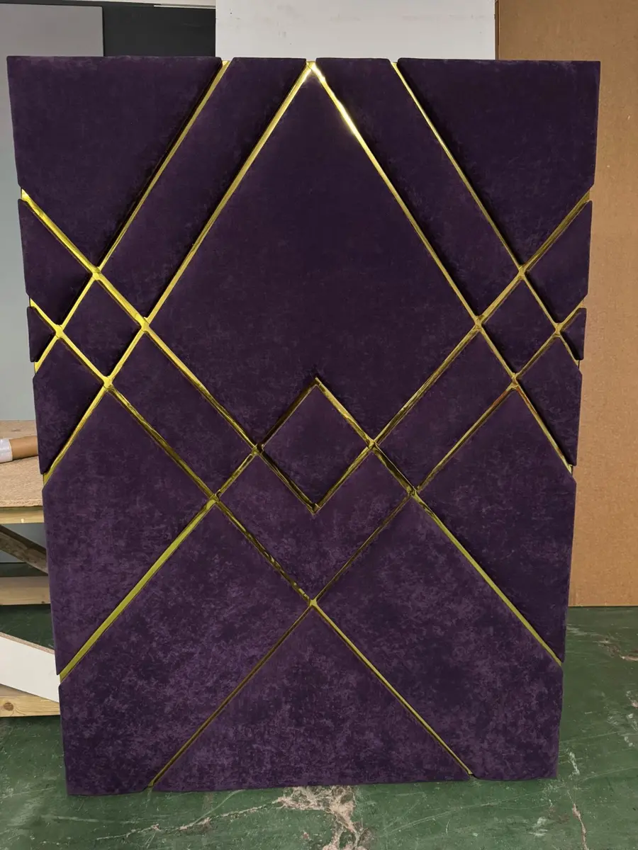 Purple diamond upholstered headboard with gold trim